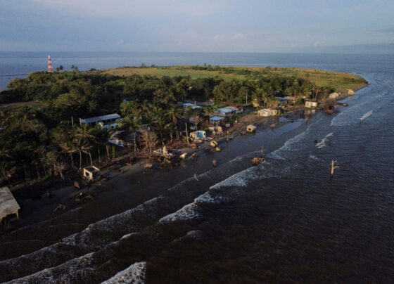The remains of houses are pictured as rising sea levels destroy homes built along the shoreline, forcing villagers to relocate, in El Bosque, Mexico. REUTERS/Gustavo Graf/File Photo