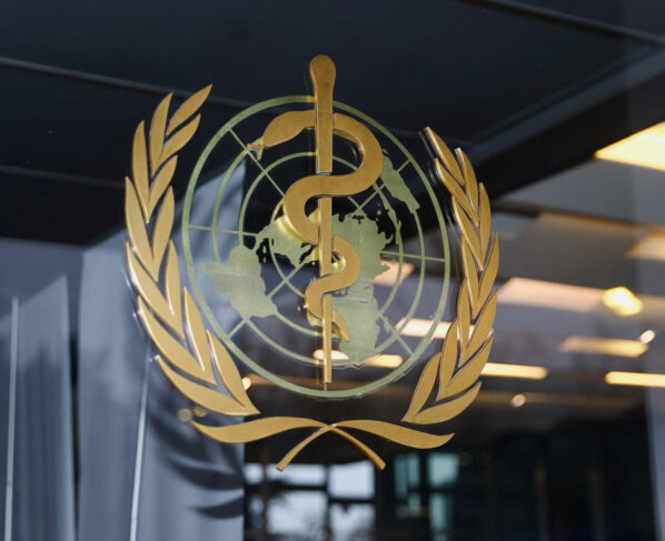 The World Health Organization logo is pictured at the entrance of the WHO building, in Geneva, Switzerland. REUTERS/Denis Balibouse