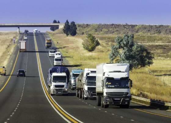 Trucks transporting goods.