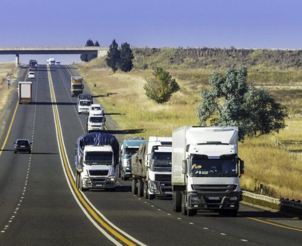 Trucks transporting goods.